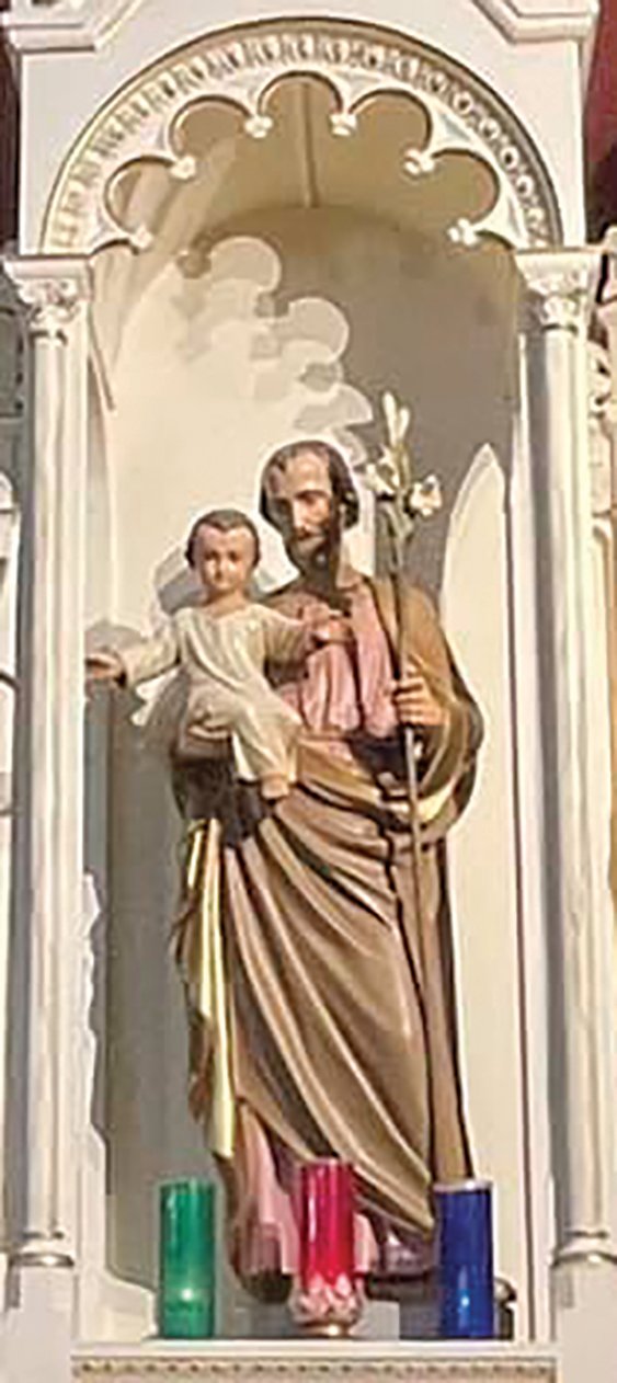Statue of St. Joseph and the child Jesus, in Sacred Heart Church in Rich Fountain.